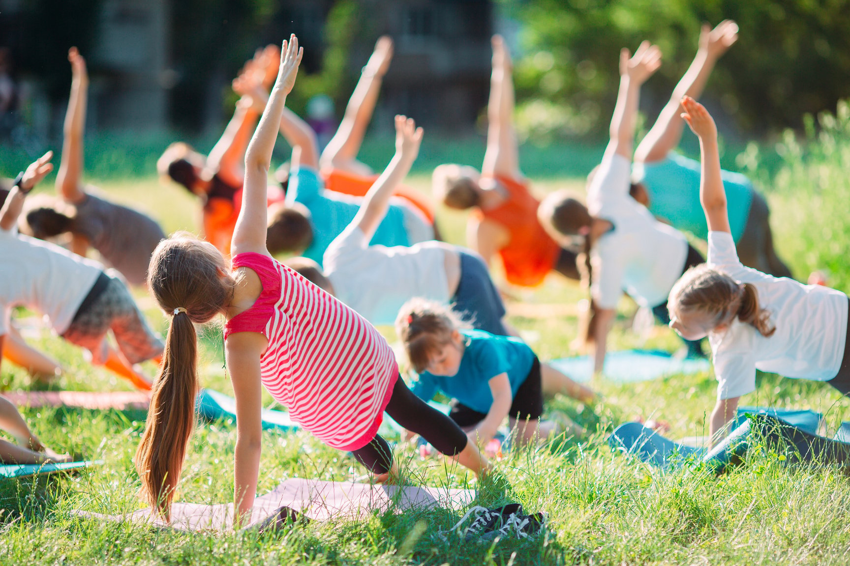 Yoga classes outside on the open air. Kids Yoga,